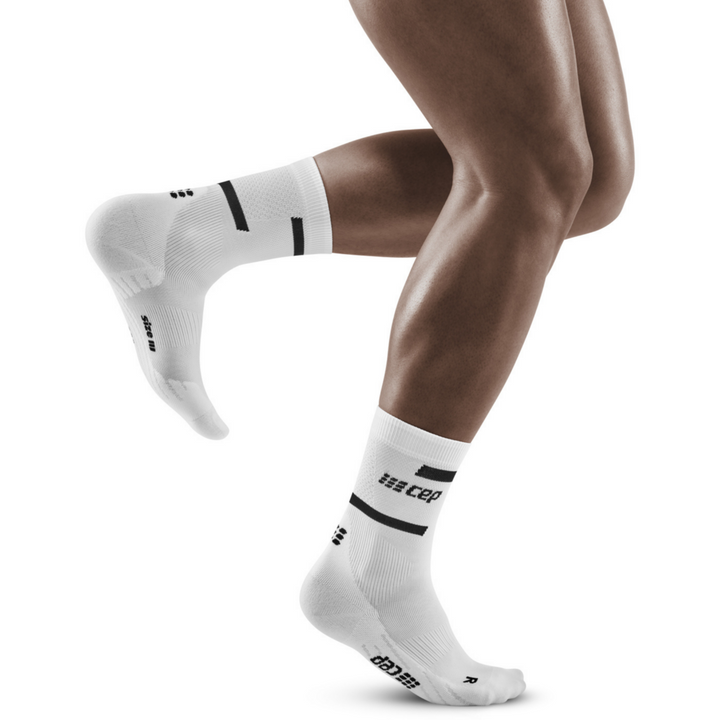 The run calcetines de compresión de corte medio 4.0, hombres, blanco