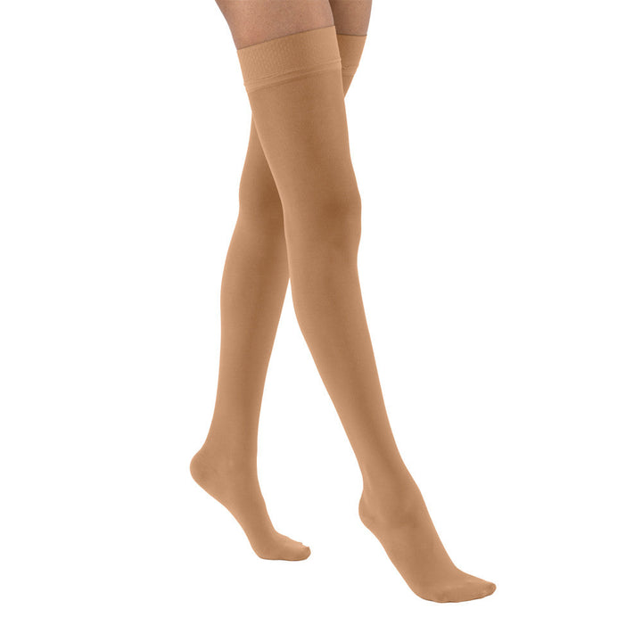 JOBST ® UltraSheer, medias hasta el muslo de 15 a 20 mmHg para mujer con banda superior de puntos de silicona, bronce solar